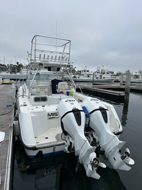 The Kate Elizabeth backed into her slip with rods stowed.